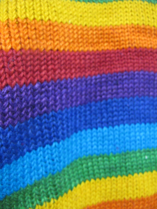 Rainbow knit wool roll neck jumper